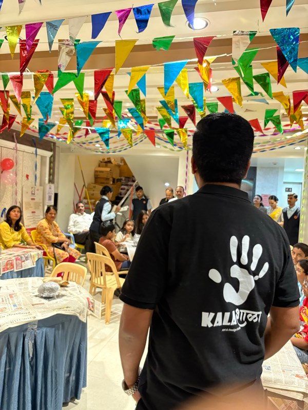Participants crafting together at a Kalashala art workshop in Pune