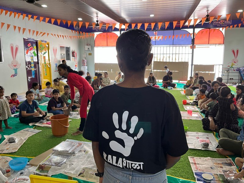 Families painting and creating at a weekend art event in Pune