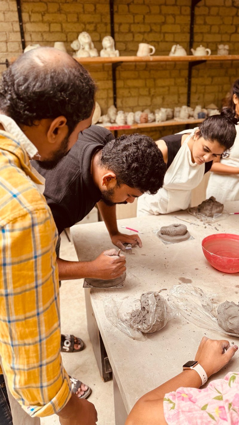 Families painting and creating at a weekend art event in Pune