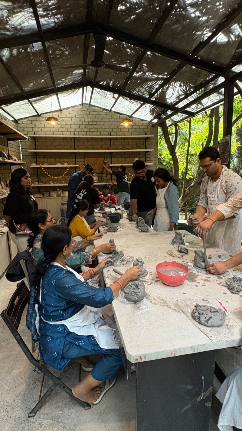 Participants crafting together at a Kalashala art workshop in Pune